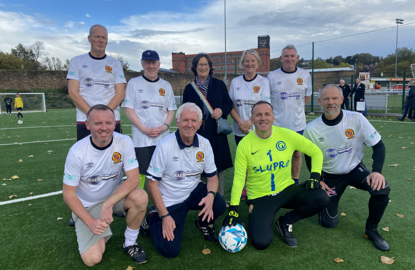 Pauline Latham OBE MP with walking football team