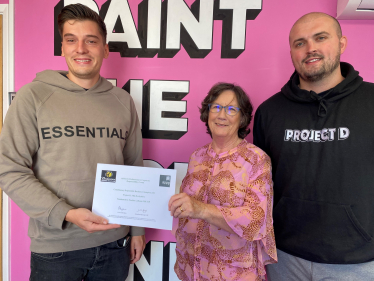 Pauline Latham OBE MP presenting certificate to Project D Doughnuts