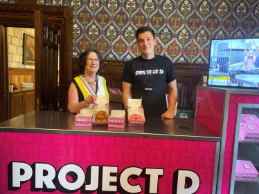 Pauline Latham OBE MP with Project D Doughnuts in Parliament